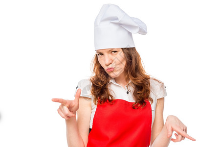穿着帽子的女孩和红围裙厨师穿着白色背景的衣图片