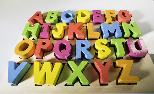 木质拼音和英文彩色字母背景图片