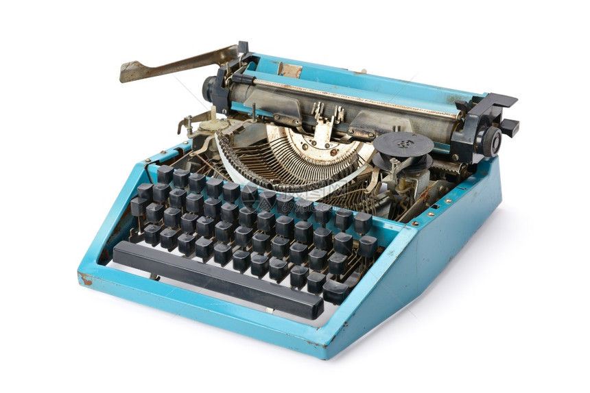 白色背景上孤立的旧打字机图片
