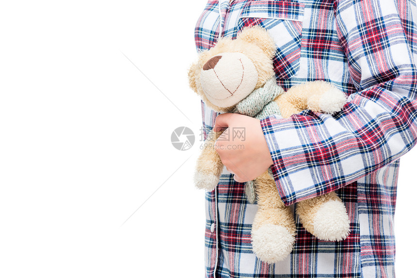 穿着睡衣的成年女子手里最喜爱的泰迪熊穿着睡衣的女成年子手里最喜爱的泰迪熊图片