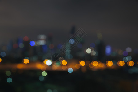 夜光天空背景中抽象的脱焦点bokeh商业城市景色区域图片