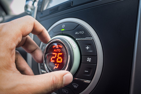汽度不凡在车辆或汽内按26度调整空按钮使其舒适背景
