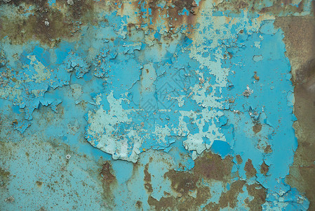 多彩背景旧生锈金属表面含蓝色涂料粉片和碎裂纹理高清图片