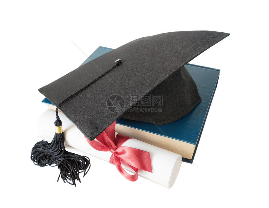 黑色毕业帽子大蓝书和纸卷用红丝带捆绑弓结在白色背景上被孤立图片