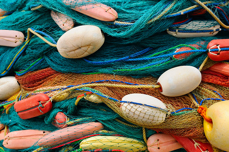 渔网线丰富多彩的渔网和浮标背景背景