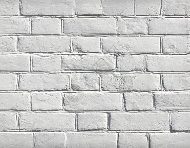 白色粗砖墙背景白色粗砖墙纹理的白色粗砖背景带有微妙的挥发图片