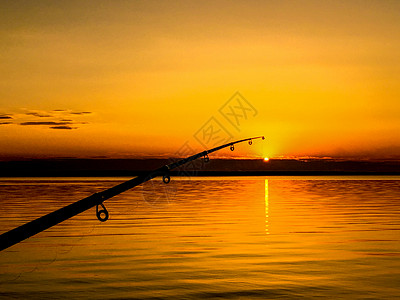 日落时渔网捕鱼棒日落时渔网捕鱼棒闲暇时间图片