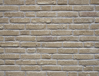 砖乳酪黄色crem砖墙水平部分带有泥接缝背景