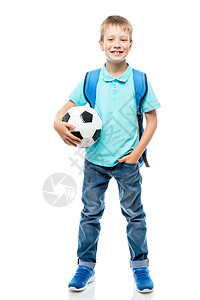 快乐的男孩拿着足球摆姿势图片