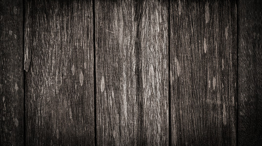 旧的黑色木质抽象背景图片