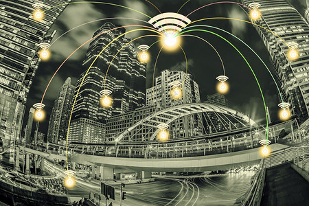 连接城市与wif图标和夜间城市外观网络连接概念图片