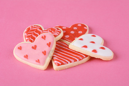 情人节和日饼干粉红背景图片