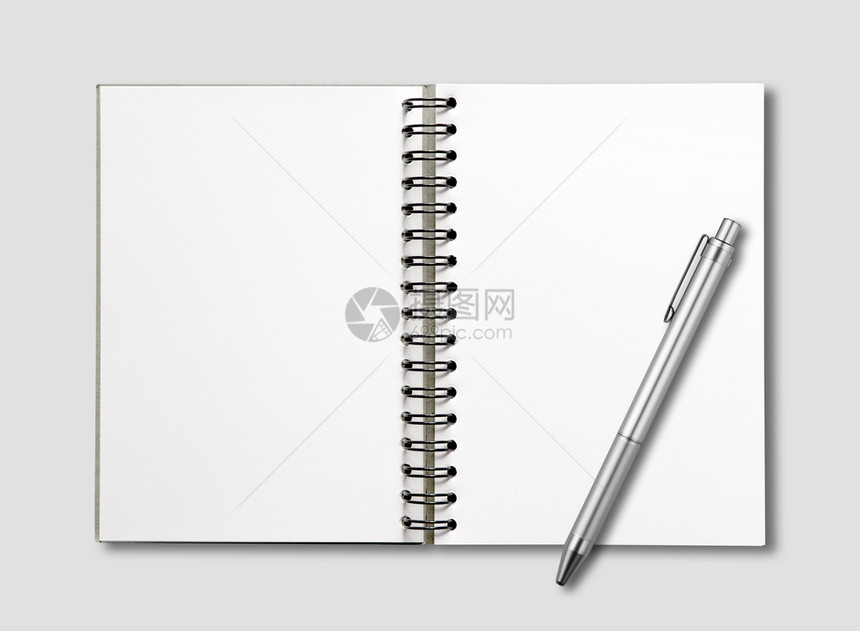 空开螺旋笔记本和在灰色上隔离空开螺旋笔和在灰色上隔离图片