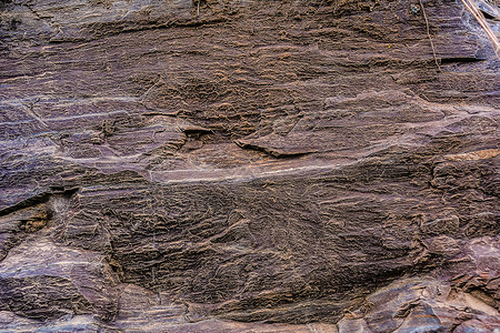 褐色风化岩石背景质表面旧石质图片