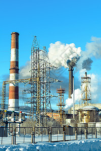 高压蒸汽冬季风景高压输电塔和工厂管环境尘埃概念工业前景空气污染管背景