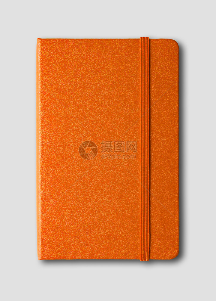 橙色关闭笔记本模型在灰色上隔离橙关闭笔记本在灰色上隔离图片