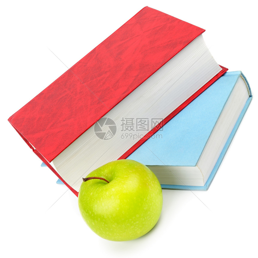 白色背景中孤立的苹果和书本图片