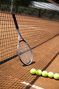 网球和球拍背景图片