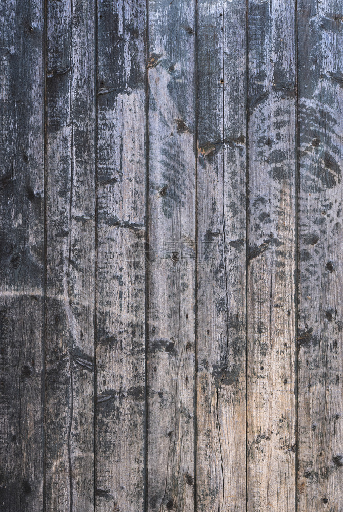 由木制谷仓门部分旧棕色灰土木头构成的背景图片