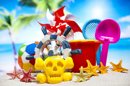 海滩上多彩的塑料玩具高清图片