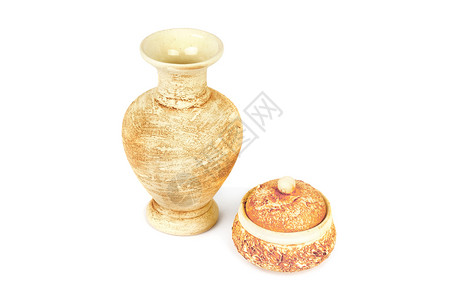 用于花朵的陶瓷瓶和用于白色背景的糖果小型花瓶装饰品图片