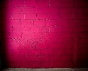 含混凝土地板的紫红色颜砖壁背景图片