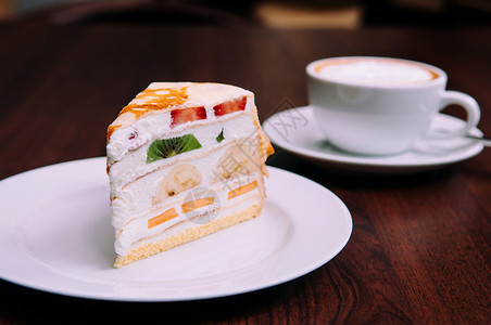 长方形奶油蛋糕果子草莓kiw贝克里咖啡厅白菜上的香蕉背景