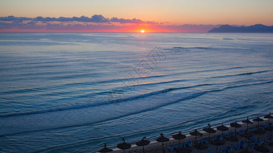 罐头的日落水美丽景色水的美中华尔卡可以食堂巴利阿里群岛西班牙没有人西班牙的巴利阿里群岛背景图片