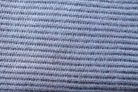 软编织物的抽象纹理其形态为灰色背景的Heringboe图片