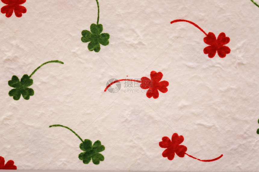 木莓纸质背景的三叶麻图片