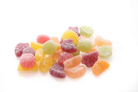 在白色背景中孤立的彩色果冻糖背景图片
