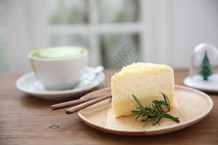 北海道蛋糕芝士蛋糕日式本含木底绿色茶背景
