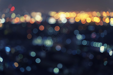 城市深夜模糊的bokeh光线的抽象背景图片