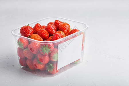 ps塑料素材保险盒里的草莓背景
