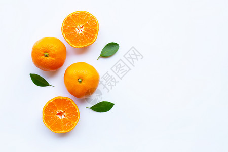 橙色柑橘水果白底有绿叶图片