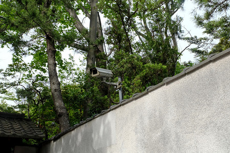警方一体摄像机用于家庭保护隐私预防犯罪和监视的citv安全摄像机灰色墙底的闭路摄像机背景