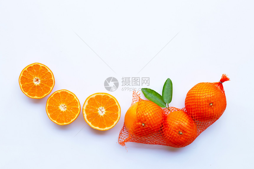 纯袋中含有高维他命c橙色其中一半子成熟白色背景图片