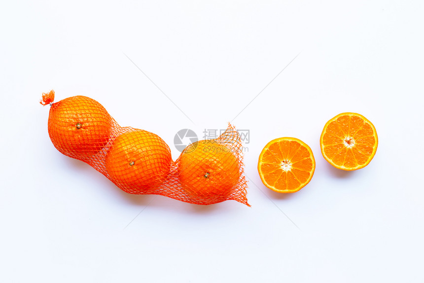 纯袋中含有高维生素c橙的纯袋中一半橙子熟白底图片