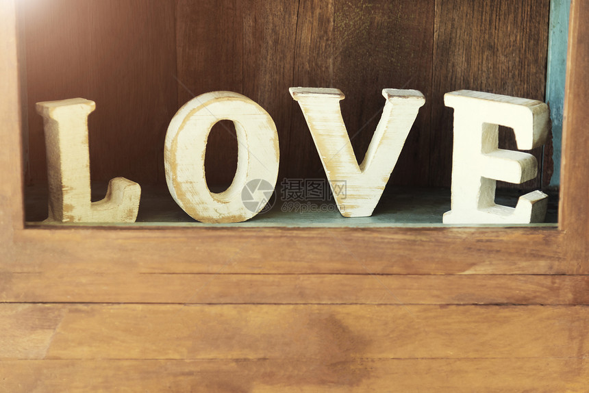 爱情人节和婚礼背景概念爱木壁柜上的质字符图片添加文字信息设计艺术工作的背景图片