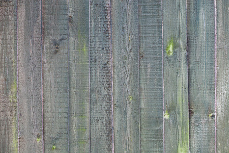 有刮痕和裂缝的旧木篱笆纹理背景图片