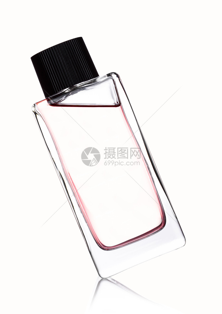 白色背景的粉红香水瓶有反光图片