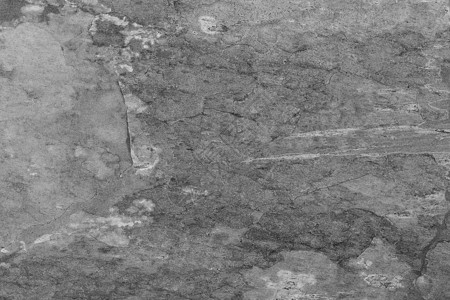 白色裂缝的灰石纹理背景图片