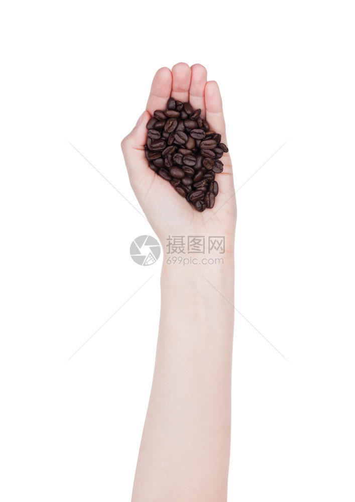 女手握着松散的新鲜咖啡豆图片