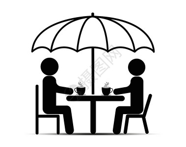 两个人坐在雨伞下面的桌子上喝茶或咖啡和聊天图片