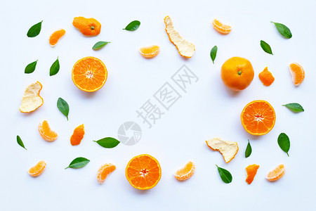 新鲜橙色柑橘水果框架白底绿色叶子图片