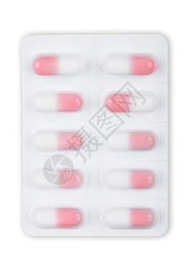 药片装在白色水泡包里背景的药丸里图片