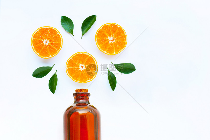 高维生素c橙色水果白底带基本油瓶图片