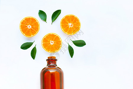 高维生素c橙色水果白底带基本油瓶图片