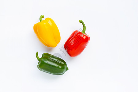 绿色黄和红新鲜的白胡椒背景图片