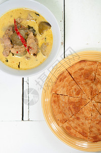 甜美的印度肉卷和黄茶咖哩图片